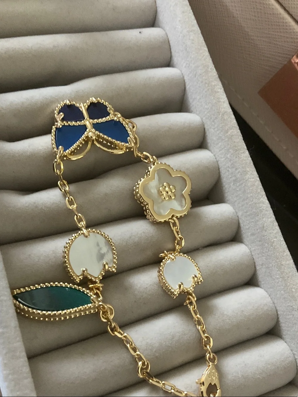 Anthropologie Gold Bracelet with Blue Butterfly and Green Charm